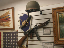 Gear used by the Bushmasters, Arizona National Guard unit that won fame serving under Gen. Douglas MacArthur in World War II, is featured at the Arizona Military Museum.