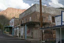 Deteriorating storefronts, shown in this photo from 2011, still dot the town of Superior, which has struggled economically since mining in the area fell off.