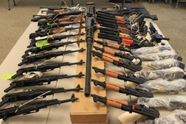 A lineup of Operation Fast and Furious weapons that were recovered in January 2011.