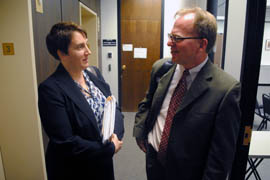 Arizona PIRG Executive Director Diane Brown speaks with Councilman Chris Thomas, of the Governor’s Regulatory Review Council. Brown advocated against the repeal of the Clean Cars program; Thomas was the only councilman who voted against the repeal.