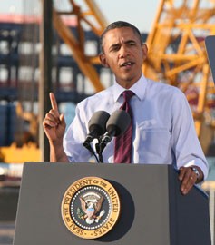 Touting manufacturing jobs as a way to boost the U.S. economy, President Barack Obama addresses a crowd of workers at an Intel Corp. semiconductor plant under construction in Chandler.