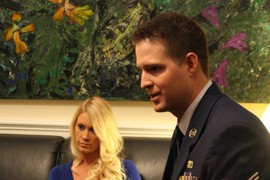 Brian Kolfage Jr. and his wife, Ashley, sit in Rep. Gabrielle Giffords' Washington office before attending Tuesday's State of the Union address. Kolfage had not spoken to Giffords since the day before the 2011 shooting that left her severely injured.