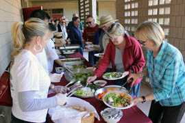 At the end of the Field to Feast tour, visitors eat produce collected from the fields visited during the day.