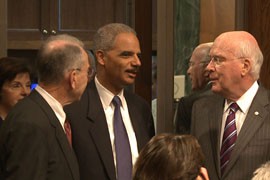 Attorney General Eric Holder, center, speaks in this file photo with Sen. Charles Grassley, R-Iowa, right, and Sen. Patrick Leahy, D-Vt., before his November testimony on Operation Fast and Furious. Grassley said Tuesday that a new report insulating Holder from blame in the operation 
