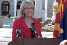 Gov. Jan Brewer helps dedicate a makeover of the State Capitol grounds completed with donated materials, volunteers and state inmate labor.