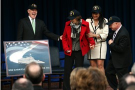 Navy Secretary Ray Mabus, left, Gabrielle Giffords, Roxanna Green and Mark Kelly react after Mabus unveiled an image of what will be the USS Gabrielle Giffords.