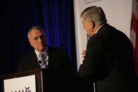 American Medical Association President Peter Carmel asks Sen. Jon Kyl, R-Ariz., about physician shortages that doctors fear could come about as a result of cuts to Medicare reimbursement rates.
