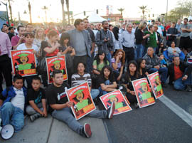 Supporters of the Dream Act assemble outside Wednesday's GOP presidential debate in Mesa.