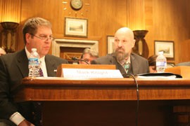 Mohave County Board of Supervisors Chairman Buster Johnson, right, looks on as Mark Knight of the National Cattlemen's Beef Association testifies to congressional lawmakers on private-property rights.