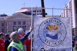 Union workers signed a large banner showing support for unions and union workers across the state.