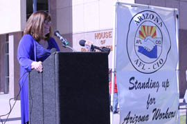 Rebekah Friend, executive director at Arizona AFL-CIO, speaks to union members during a rally at the Capitol. She was one of the main organizers of the event.