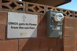 A sign touts sustainability efforts at Our Mother of Sorrows, a Roman Catholic church in Tucson.