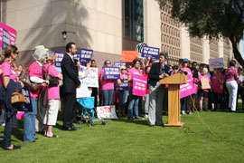 Sen. Paula Aboud, D-Tucson, addresses a crowd at a women's rally outside the Arizona State Capitol.