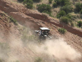 An off-highway vehicle travels through the Tonto National Forest.