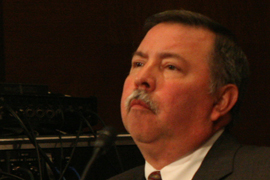 Express Scripts CEO George Paz testifies at a Senate subcommittee hearing in December  2011. Paz said the company's Tempe operations are vital to the business and would remain so even if its proposed $29.1 billion acquisition of rival Medco went through.