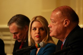 Arizona Attorney General Tom Horne said he would appeal a federal court's rejection of part of the state's voter registration law to the Supreme Court, the latest of several Arizona issues appealed to the high court. Horne is shown in a March meeting with attorneys general Pam Bondi of Florida and Greg Abbott of Texas.
