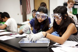 BASIS students Shreya Patel and Shakilla Maniraju work in a lab in the Scottsdale school, which was twice ranked in the top five in the country in two recent, independent rankings.