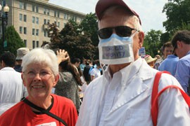 Jane and George Pauk traveled from Phoenix to protest outside the Supreme Court as it delivered its decision on the Patient Protection and Affordable Care Act. They said they object to the inefficient patient care and insurance company profit they feel the act allows.
