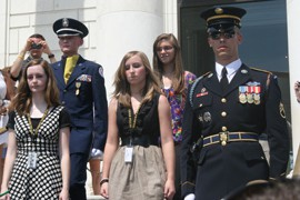Gilbert High School band members, from left, Melissa Pierce, Michael O'Connor, Justine Cote and Moriah Corbin are escorted to the Tomb of the Unknowns to place a wreath.