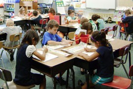 In 2010, Virginia spent an average of $10,597 per public grade school student, like those shown here, compared to $7,848 spent per pupil in Arizona in the same year.