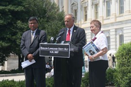 Nelson Garcia of U.S. English, Rep. Steve King, R-Iowa, and Rosalie Pedalino Porter of the group ProEnglish, from left, speak outside the Capitol in support of King's bill to make English the official language of the U.S. government.