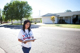 Volunteer Marissa Galindo will visit about 50 homes in an afternoon. The volunteers go to areas with high Latino populations that have low voter turnout.