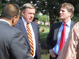 Arizona State University President Michael Crow (left) talks with Phoenix Mayor Greg Stanton (right) at a groundbreaking ceremony for a student-funded $25 million expansion of the recreation center at ASU's Downtown Phoenix Campus.