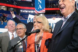 Gov. Jan Brewer waits to announce the votes of the Arizona delegation during the roll call of the states at the Republican National Convention Tuesday.