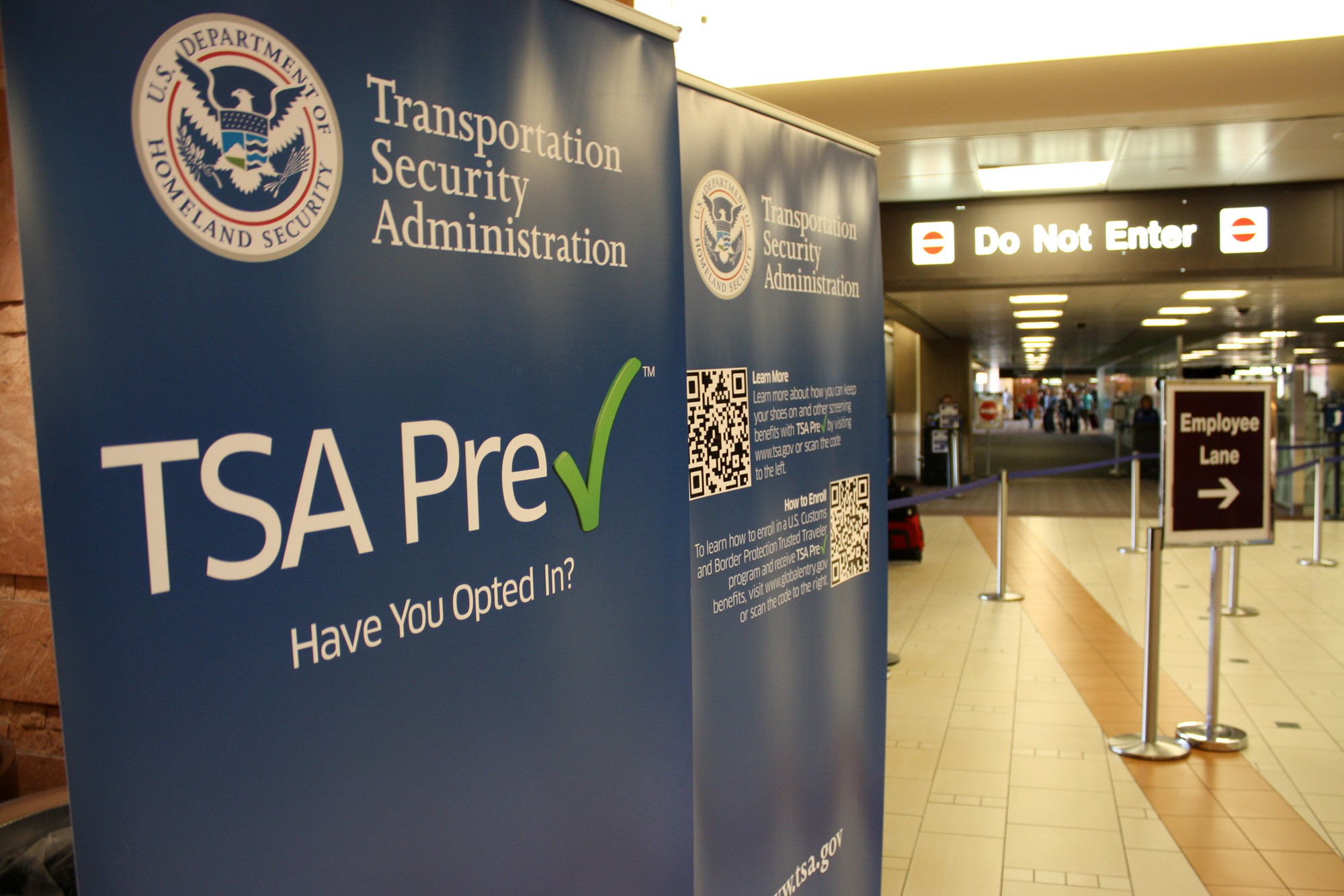 By participating in the TSA's Pre-Check program, eligible passengers can keep their shoes on, wear a light jacket and wear a belt when going through security. However, their bags are still X-rayed, they're required to pass through a metal detector and passengers aren't always guaranteed an expedited process.