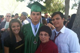 Gloria Castillo (second from right), 65, celebrates grandson Hauss' graduation from Sunnyslope High School, with his sister, Maiya, and brother, Joshua. All three are Castillo's grandkids, whom she has raised for the past 13 years. Hauss plans to attend Glendale Community College.