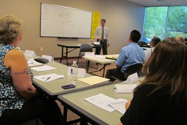 Andrew Ridley, trainer for Maricopa Workforce Connections, leads an interviewing techniques workshop last month in Phoenix. One focus of the workshop is reducing the stress of job searching.