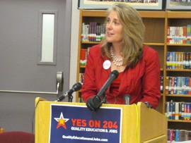 Ann-Eve Pedersen, president of the Arizona Education Network, backs up Proposition 204 in Phoenix on Tuesday and calls the sales tax a solution to the state's education funding woes.