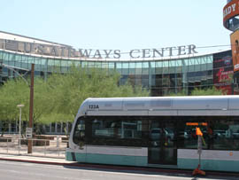 A light-rail train passes US Airways Center.