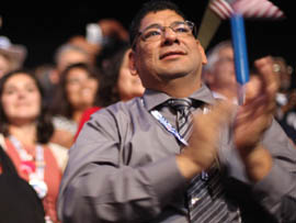 Yuma resident Frank Bernal, an Arizona delegate, cheers on the floor of the Democratic National Convention.