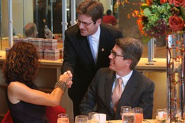 Phoenix Mayor Greg Stanton chats up attendees at a luncheon in Washington for convention organizers. Stanton was at the meeting to pitch Phoenix as a potential convention and tourism destination.