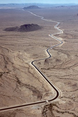 The Central Arizona Project acqueduct snakes across the desert west of the greater Phoenix area.