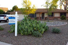 A home for sale in Tempe. Realtors say home prices in Arizona are rising as the number if distressed properties is reduced and housing inventory shrinks.