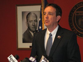 Secretary of State Ken Bennett addresses a news conference Tuesday at which he said he is looking for ways to count early ballots faster in Arizona.