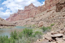 An artist's rendering of the proposed tramway from the rim of the Grand Canyon to the elevated walkway along the bank at the confluence of the Colorado and Little Colorado rivers as part of a proposed tourism development there.