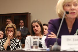 Audience members wipe away tears as Newtown, Conn., Schools Superintendent Janet Robinson testifies to Congress about the attack last month in an elementary school that killed 26 people, 20 of them schoolchildren, in her town.