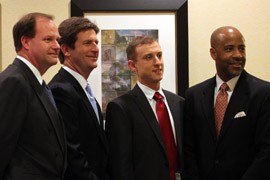 Phoenix Mayor Stanton, second from left, with Aerospace Industries Association Vice President Cord Sterling, Bipartisan Policy Center analyst Shai Akabas and Senate aide Darrel Thompson, left to right, after a meeting on the effects of looming federal budget cuts.