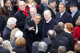 President Barack Obama waves at Monday's inauguration ceremony, where his inaugural address included a call for action on immigration reform, among other measures.