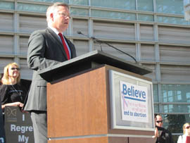 Maricopa County Attorney Bill Montgomery addresses a rally outside the federal courthouse in Phoenix on the 40th anniversary of the U.S. Supreme Court's Roe v. Wade decision legalizing abortion.