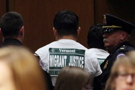 Police lead a protester out of the hearing on immigration reform that was interrupted repeatedly by demonstrators angry over the government's deportation of immigrants. Homeland Security Secretary Janet Napolitano was the main witness at the hearing.
