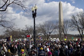 Protesters from more than 160 organizations, according to organizers, marched from the Washington Monument to the White House on a frigid, windy day to register their opposition to the Keystone XL pipeline.