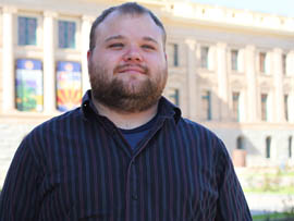 Chris Spiva, a former foster child, credits attending college with helping him transition successfully to adult life.