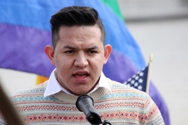 Jerssay Arredondo of Phoenix speaks out at a rally at the Supreme Court, during the second of two days of historic hearings on the laws restricting same-sex marriages.