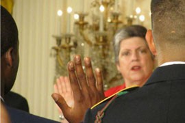 Homeland Security Secretary Janet Napolitano administers the oath of citizenship to members of the military at a special White House ceremony on July 4, 2012.