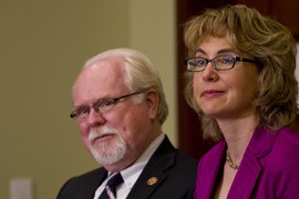 Rep. Ron Barber, D-Tucson, and his predecessor, Gabrielle Giffords, at an event to name a Capitol room in honor of former Giffords' aide Gabe Zimmerman. He was one of six killed in the 2011 shooting in which Barber, Giffords and 11 others were wounded.
