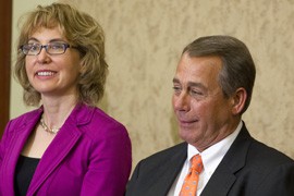 Former Rep. Gabby Giffords, D-Tucson, with House Speaker John Boehner listen at a ceremony honoring Gabe Zimmerman, a Giffords aide who was one of six killed in the 2011 Tucson shooting that wounded Giffords and 12 others.